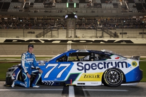 Carson Hocevar poses for a photo during qualifying for the 2026 Daytona 500 at Daytona International Speedway on February 11, 2026.