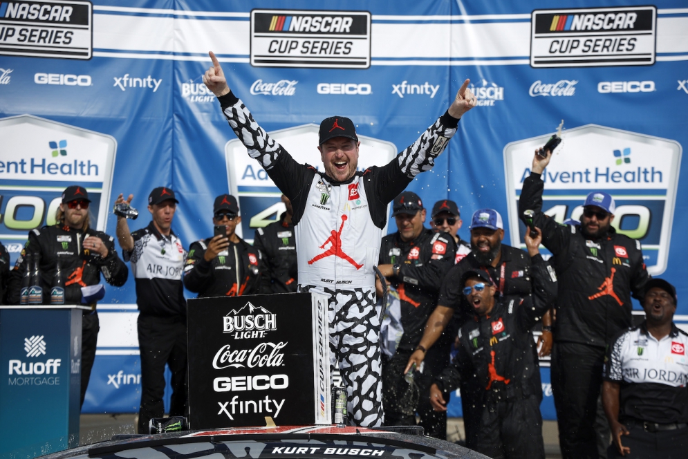Kurt Busch celebrates in Victory Lane after winning the AdventHealth 400 at Kansas Speedway on May 15, 2022. It would be his final career victory, as he has announced his retirement from Cup racing.