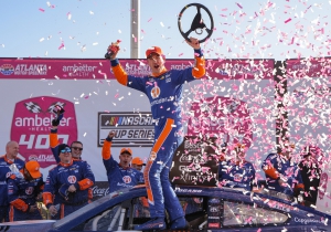 Joey Logano, driver of the #22 Ford for Team Penske, celebrates in victory lane after winning the Cup series race at Atlanta Motor Speedway on March 19, 2023.