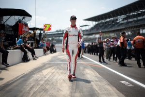 Denny Hamlin walks the grid during qualifying at Indianapolis Motor Speedway in July. Hamlin&#039;s 23XI Racing team, alongside Front Row Motorsports, have filed an antitrust lawsuit against NASCAR.