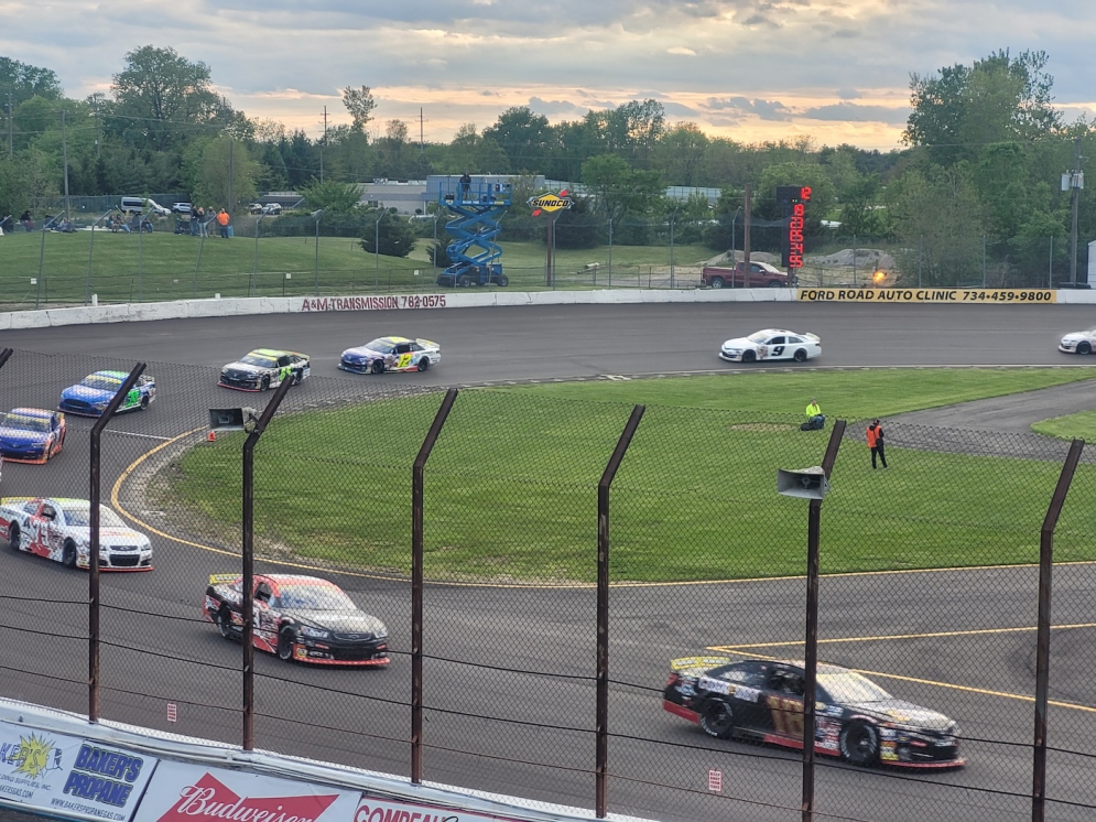 Max Reaves leads at Flat Rock Speedway on Saturday night, on the way to his third straight victory in the No. 18 Joe Gibbs Racing entry.
