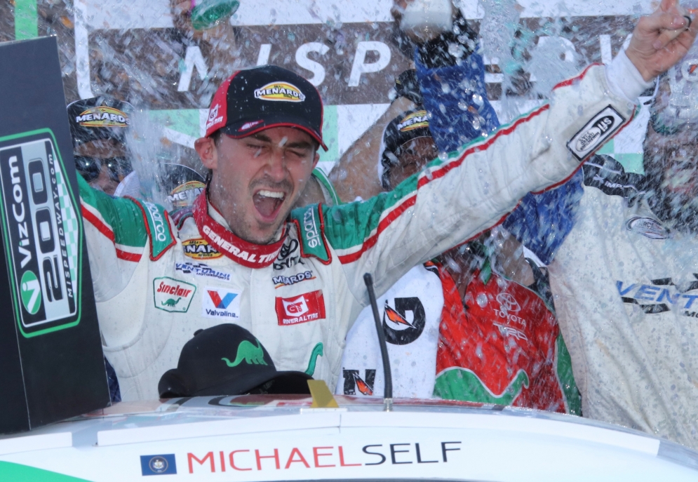 Michael Self celebrates a win at Michigan Speedway.