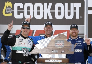 RFK Racing co-owner Brad Keselowski (left) is pictured in Victory Lane at Richmond with his teammate Chris Buescher last week. Keselowski hopes to be the victorious drive this week at his home track in Michigan, and lock himself into the playoffs.